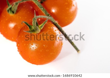 Pachino tomatoes. Cherry tomatoes isolated on the white background stock photo.