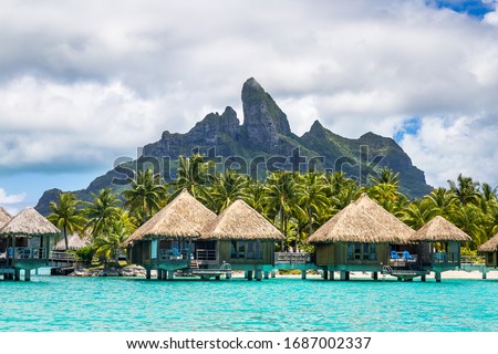 Overwater Bungalows in French Polynesia (Bora Bora and Moorea) Royalty-Free Stock Photo #1687002337