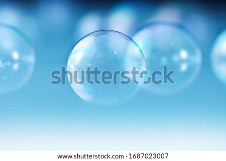 Soap bubbles on abstract background