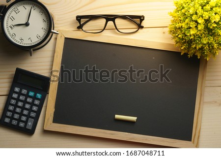 coronavirus conceptual. composition of office supplies on wooden desk with copy space for text. flat lay Royalty-Free Stock Photo #1687048711