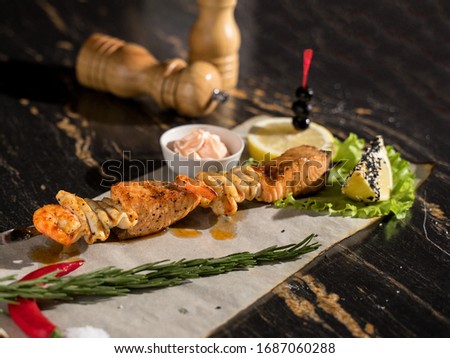 grilled seafood, skewered dishes, grilled pollock, grilled squid, seafood asarti