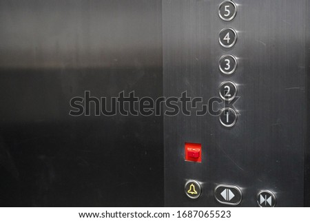 closeup of buttons control in elevator background.