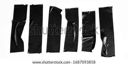 Set of black tapes on white background. Torn horizontal and different size sticky tape, adhesive pieces. Royalty-Free Stock Photo #1687093858