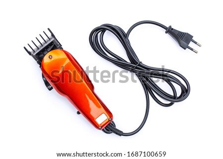Hair clipper isolated on white background. Royalty-Free Stock Photo #1687100659