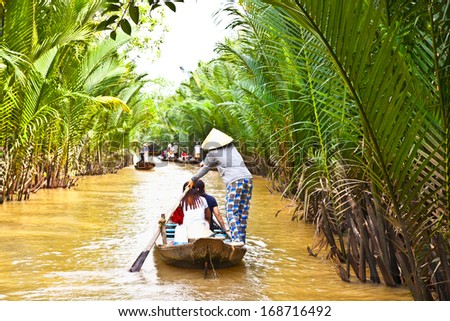 A famous tourist destination is  Ben Tre village in Mekong delta , Vietnam. Mekong Delta is home of people who live along the many channels.