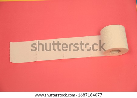 toilet paper toilet roll on pink back ground