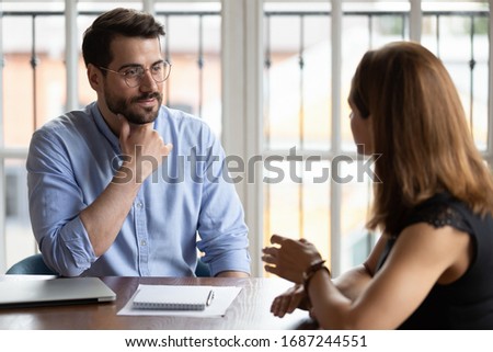 Business meeting, job interview and staffing hiring process, applicant and HR manager, mentor gives instructions to new employee, customer and company representative communication in office concept Royalty-Free Stock Photo #1687244551