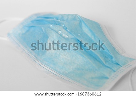 Outer layer of surgical face mask is waterproof layer, can protect people from fluid when others cough or sneezing, protect Corona disease 