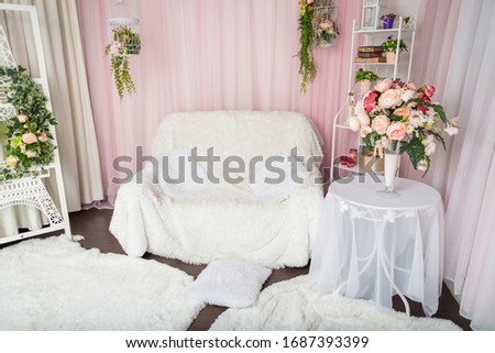 Bright interior with a cozy armchair