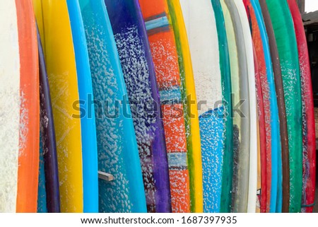 Texture of surfboards, covered in paraffin, stored waiting for a surfer on the beach of Canggu, south of Bali, Indonesia, on a hot August day.