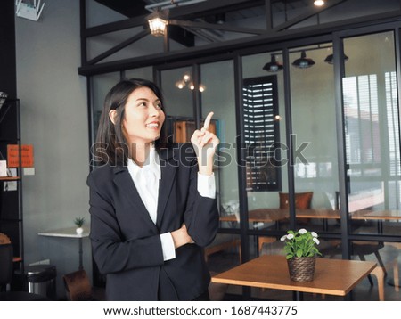 asia business man woman standing cross arm and pointing,thumbs up,looking camera copy space
