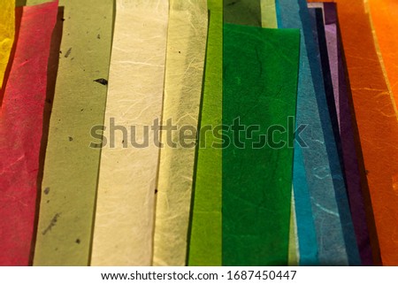 colorful handmade paper hang on the wall