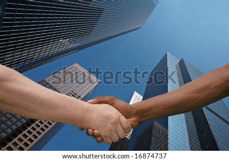 Two Men of Different Ethnicities Shaking Hands in Agreement