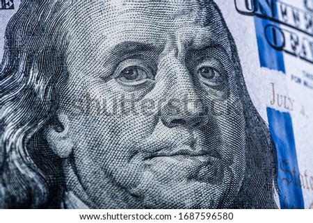 Portrait of Benjamin Franklin on one hundred dollar bill