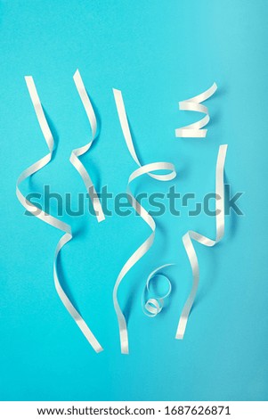 White confetti stripes on blue background