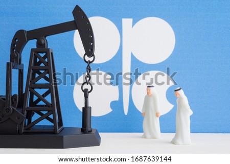 Spending or investment of a country's revenues from petroleum exports industry (Petrodollar). Oil pump jack arab men with OPEC flag background. Concept of crude oil price rise or decrease, petroleum.