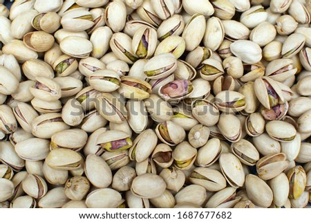 close up top view of many pistachios beans