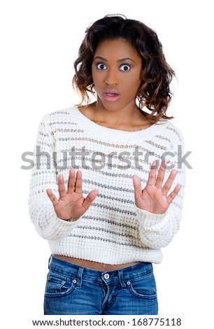 Closeup portrait of beautiful shocked mad young woman raising hands up to say no stop right there, isolated on white background. Negative human emotion facial expression feelings, signs and symbol Royalty-Free Stock Photo #168775118
