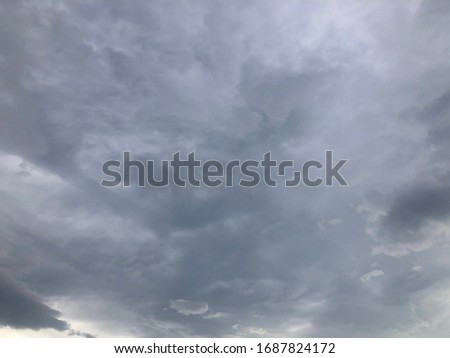 Full frame of dark cloudy rainy of white and gray color atmosphere.