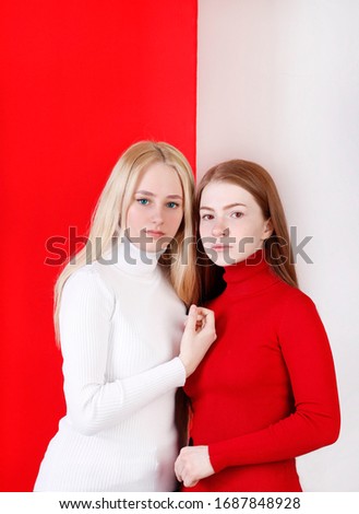 Girls in the Studio on a red and white background