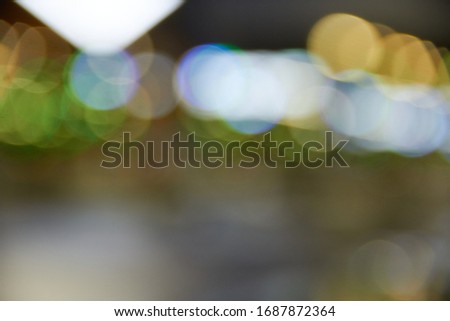 blurred background of night lights after rain