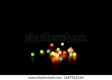 Multicolored bokeh on a black background