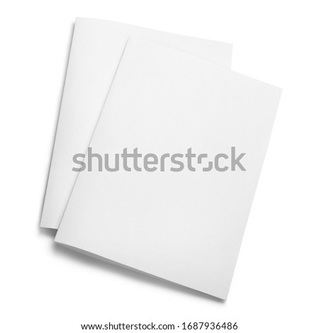 Folded sheets of white paper, isolated on white background Royalty-Free Stock Photo #1687936486