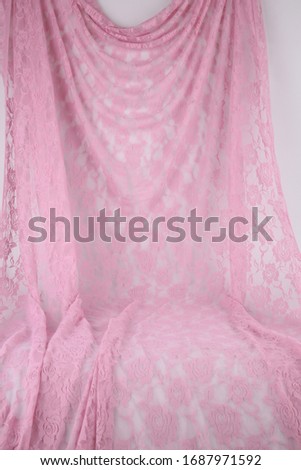 Delicate pink lace on the table