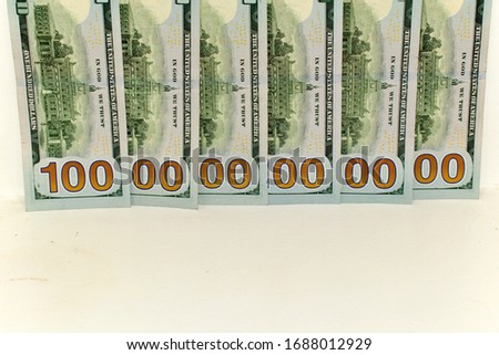 one trillion dollars on a white wall Royalty-Free Stock Photo #1688012929