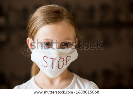 stop corona virus outbreak.Girl in protective sterile medical mask on her face, stop virus. Air pollution, Chinese pandemic coronavirus concept.STOP Coronavirus. Pills and medicine masks Royalty-Free Stock Photo #1688015068