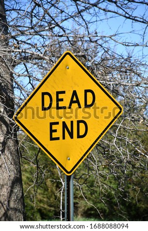 Dead end street sign on a rural road