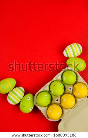 Decorated Easter eggs on a red background