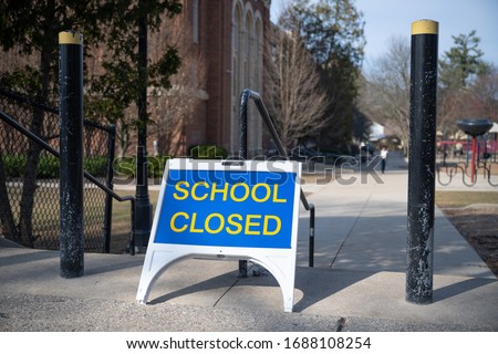 A "closed" sign outside of a public school in Grand Rapids, Michigan. The state closed all schools in March 2020 to thwart the spread of the novel coronavirus.