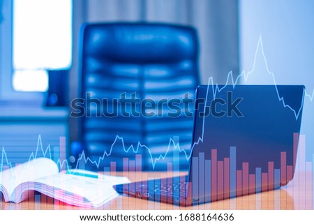 Schedule on the background of the workplace. The workplace of the broker. Concept - an increase shareholder value. Stock Exchange. Concept - broker career in the stock market. Graph indicators go up Royalty-Free Stock Photo #1688164636
