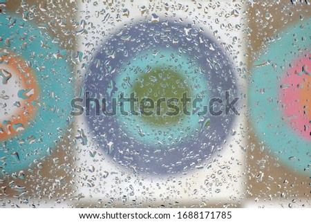 water drops on a multicolored background macro