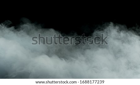 Photo of Real Smoke on a black background - realistic overlay for different projects. Royalty-Free Stock Photo #1688177239