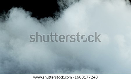 Photo of Real Smoke on a black background - realistic overlay for different projects.