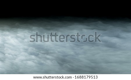 Photo of Realistic Clouds on black dark Background. Royalty-Free Stock Photo #1688179513