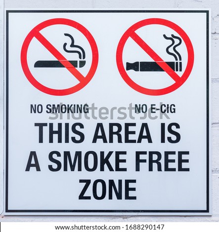 This Area is a Smoke Free Zone Sign with no smoking symbols