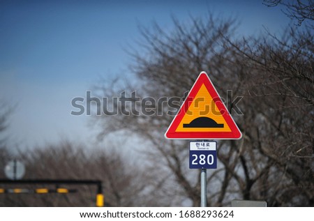 Speed bump Traffic sign on Korean road
