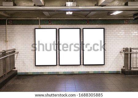 advertisement billboards electronic displays in a subway station in New York City Royalty-Free Stock Photo #1688305885