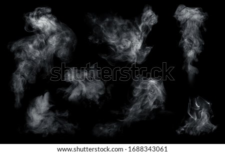 Fog or smoke set isolated on black background. White cloudiness, mist or smog background.  Royalty-Free Stock Photo #1688343061