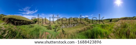 A landscape pictures of the country of Madagascar, with mountains and meadows