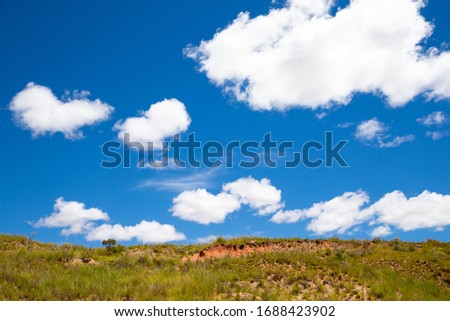 A landscape pictures of the country of Madagascar, with mountains and meadows