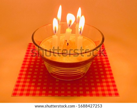 This is a picture of five candle flames.