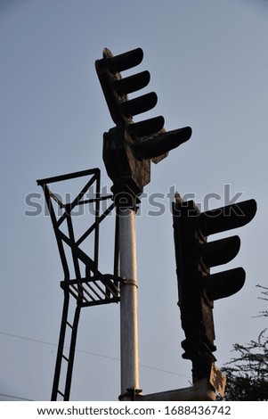 close up view of another angle  of railway signaling with sky color background 