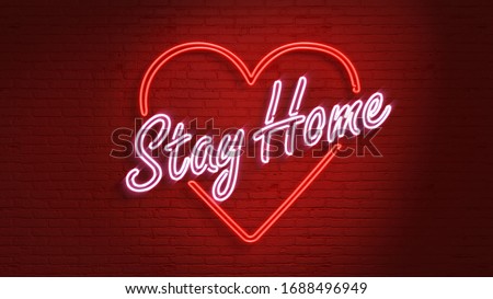 Stay Home Neon message on the wall