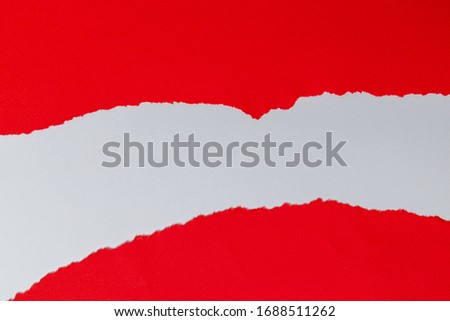 Red torn paper with white copy space.