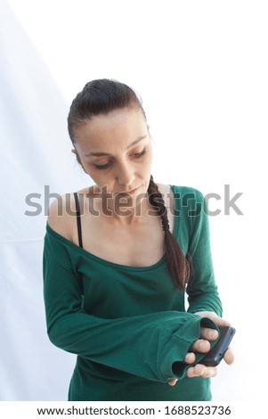 young girl with braid taking a selfie