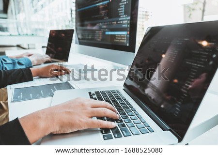 Developing programmer Team Development Website design and coding technologies working in software company office Royalty-Free Stock Photo #1688525080